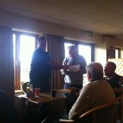 Terry Daly barely acknowledges receiving the horseshoe at Garstang