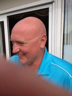 Stu shows off his sunglasses tan after the game
